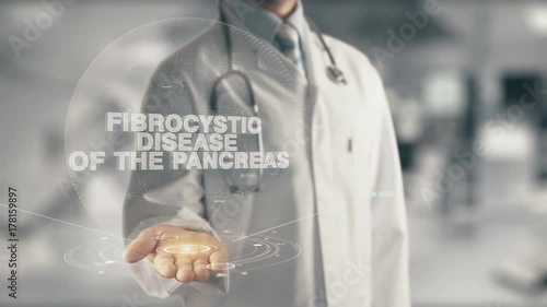 Doctor holding in hand Fibrocystic Disease of the Pancreas photo