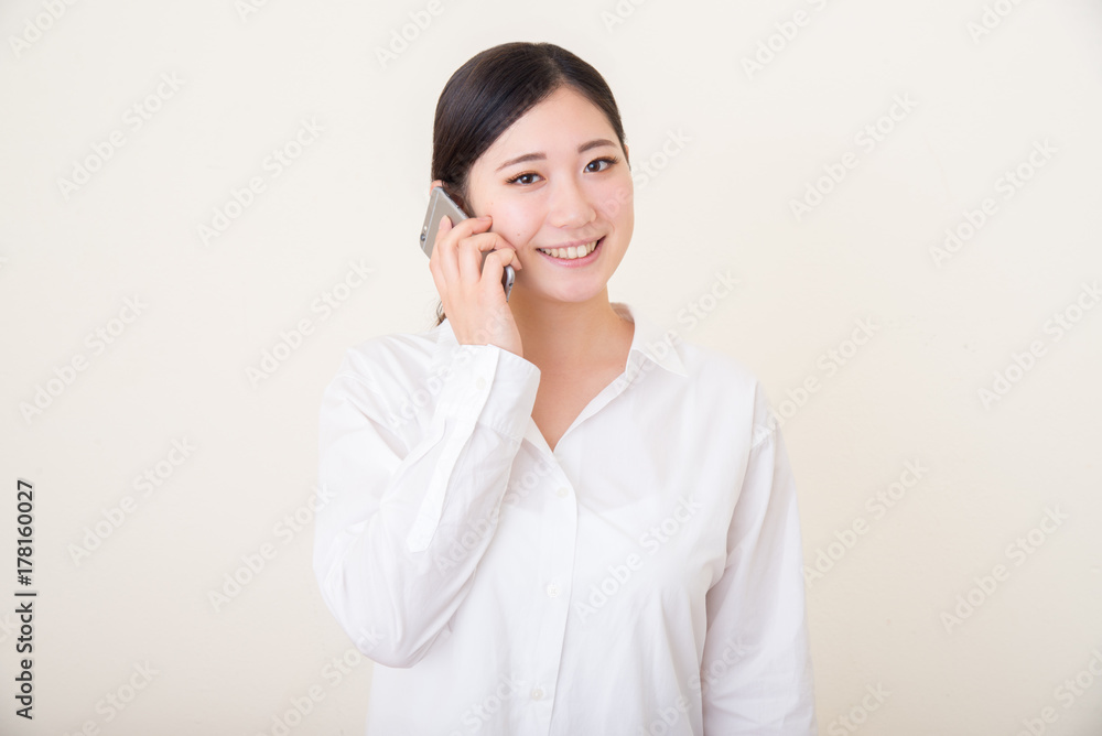 young asian woman using smart phone young asian woman using smart phone
