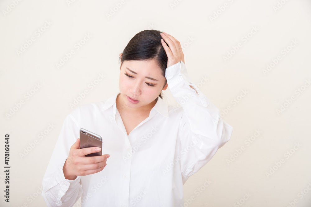young asian woman using smart phone young asian woman using smart phone
