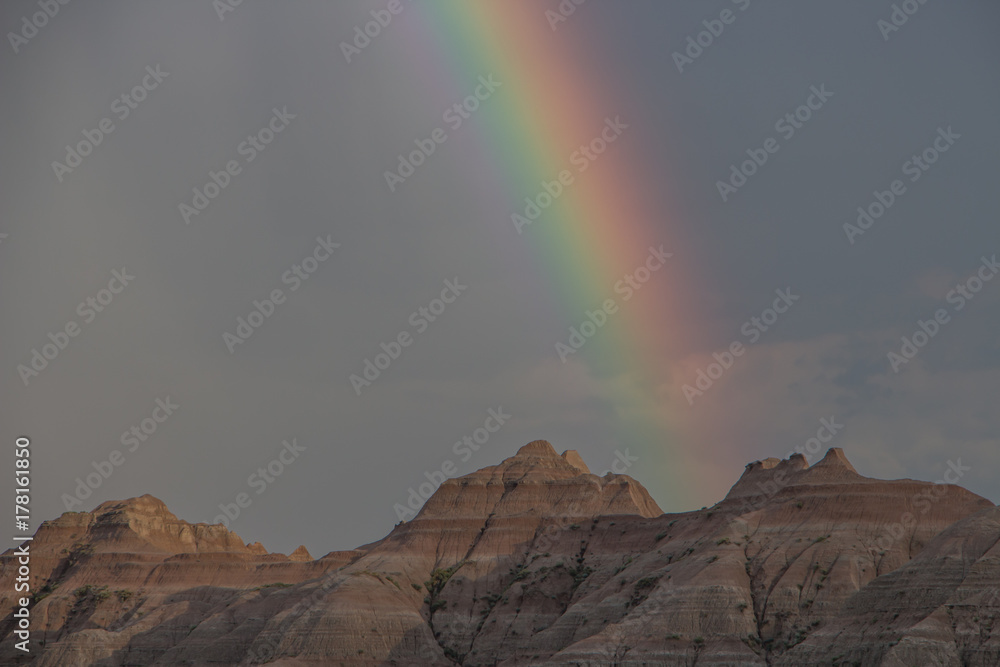 Rainbow over the Badlands National Park rock formations
