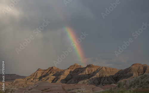 Rainbow over Badlands National Park rock formations