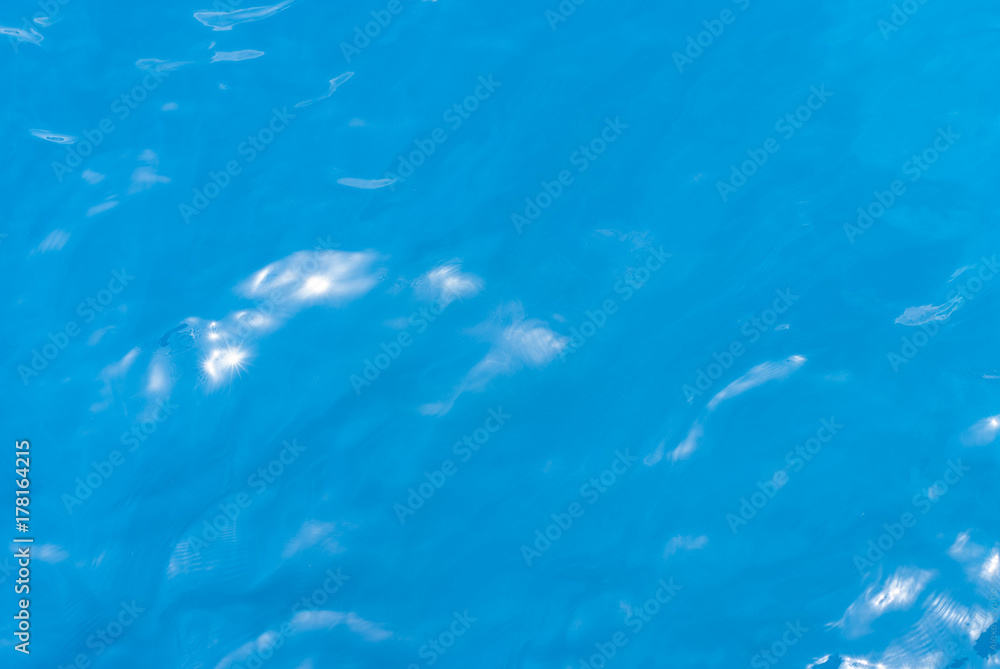 a deep blue sea water surface with highlights a deep blue sea water surface with highlights