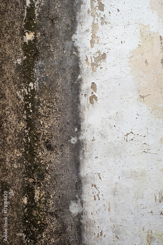 texture of the wall with mold and rust and cracks and peeling plaster