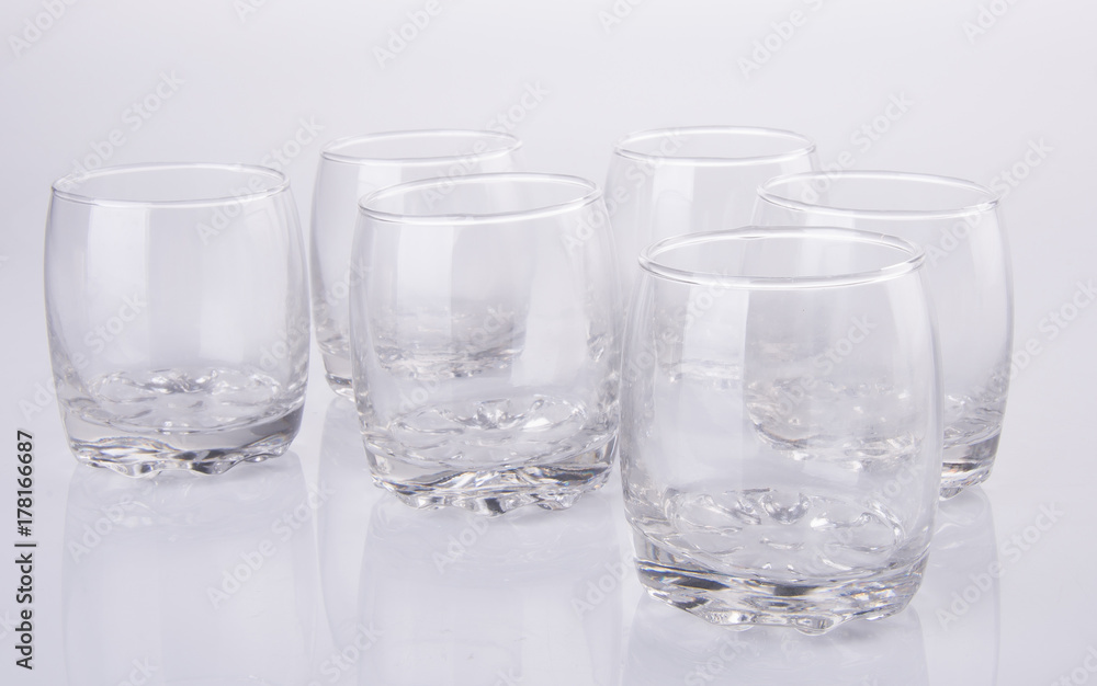 glass cup or empty glass mug on background. glass cup or empty glass mug on background.
