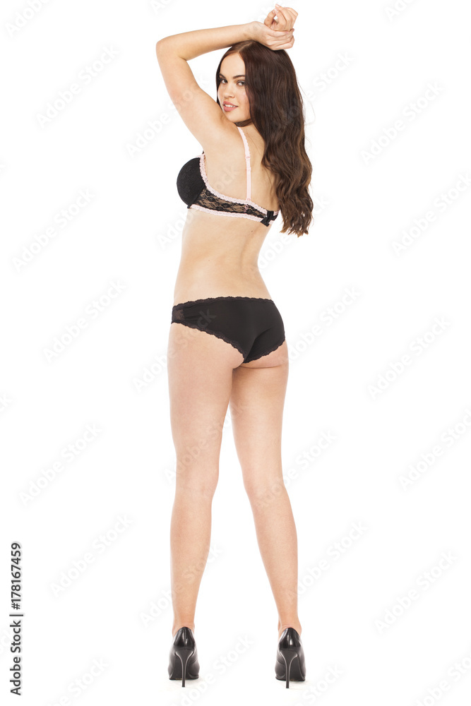 Full length portrait of young girl wearing bikini Full length portrait of young girl wearing bikini