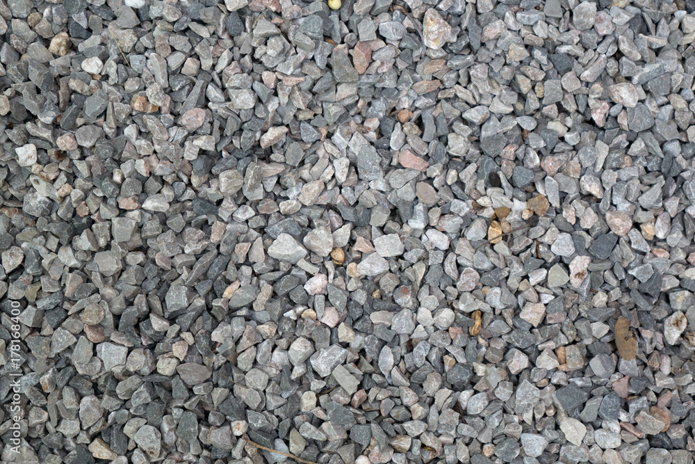 Abstract pebble gravel stone at the beach use for background ready for add text or graphic Abstract pebble gravel stone at the beach use for background ready for add text or graphic