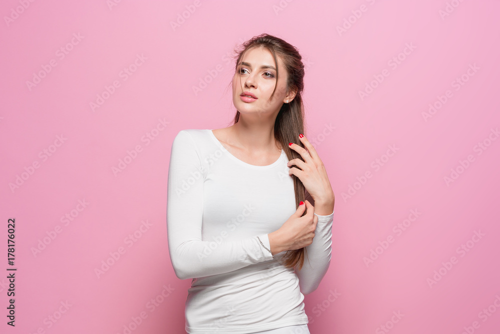 The young woman's portrait with thoughtful emotions The young woman's portrait with thoughtful emotions