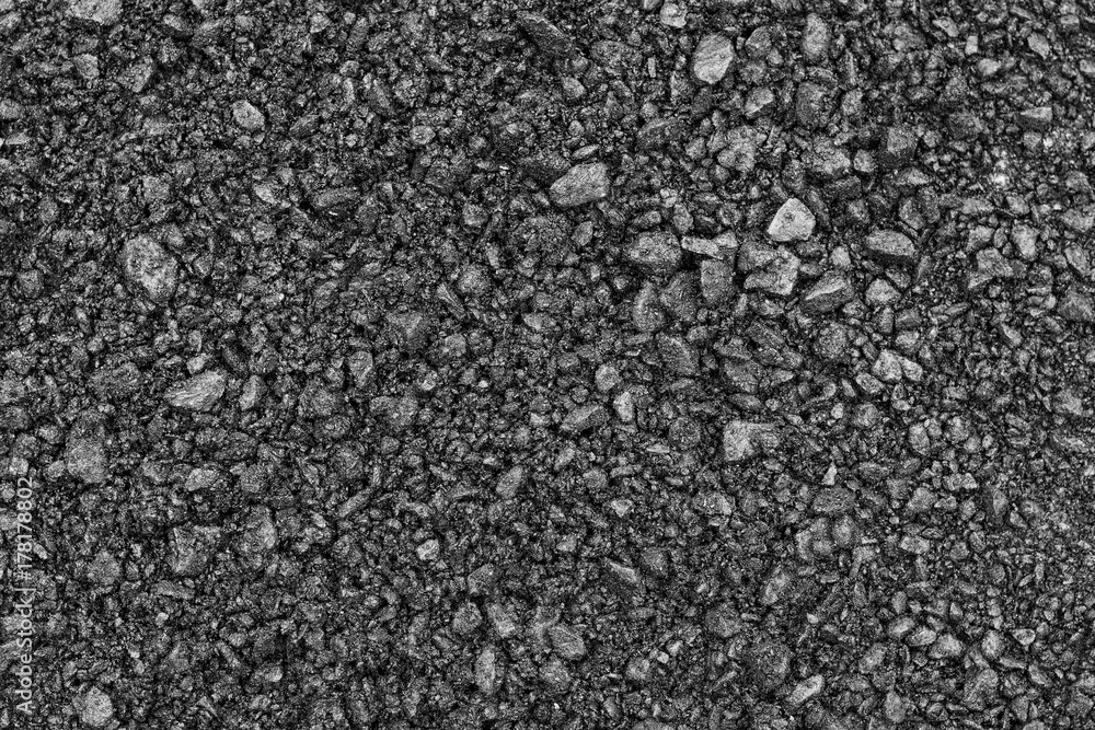 The texture of asphalt with large stones The texture of asphalt with large stones