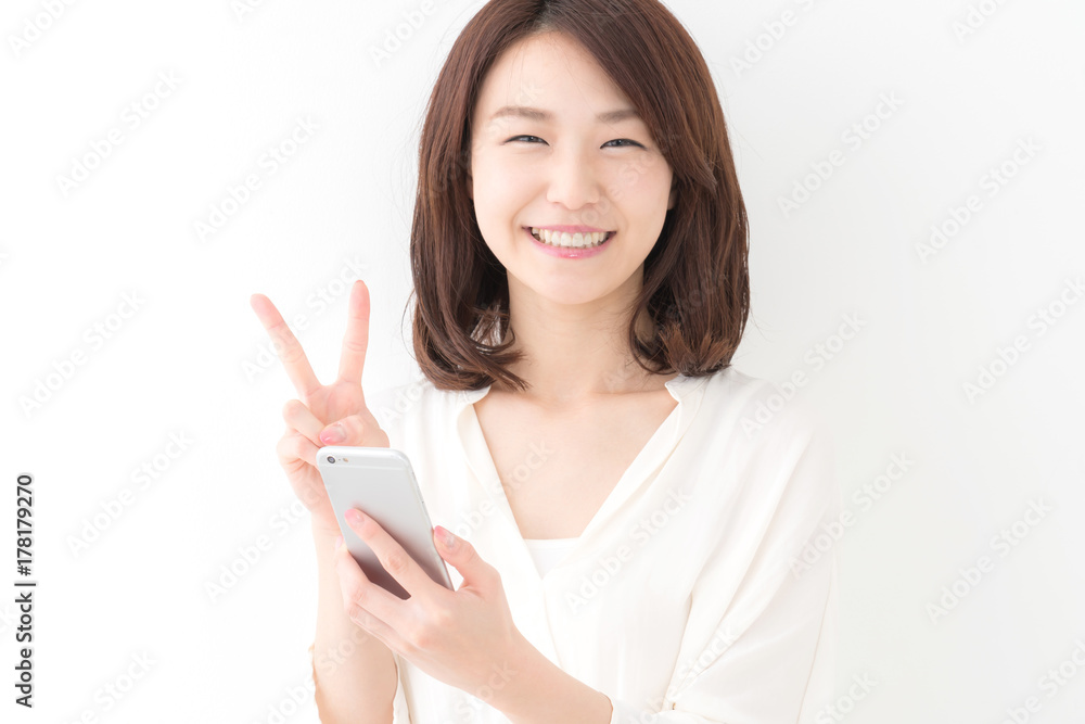 若い女性・スマートフォン 若い女性・スマートフォン