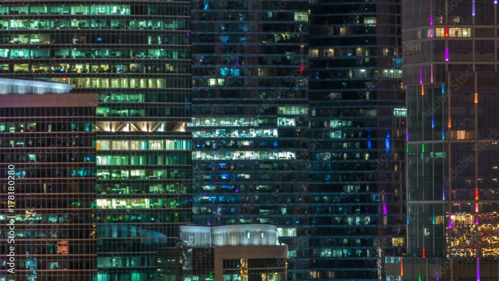 Modern office building with glowing windows at night timelapse. Moscow city Modern office building with glowing windows at night timelapse. Moscow city