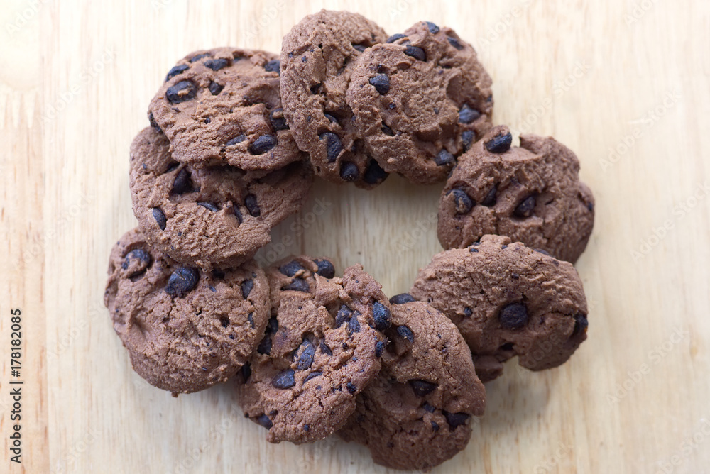 Chocolate cookies on wooden table. Chocolate chip cookies top view Chocolate cookies on wooden table. Chocolate chip cookies top view