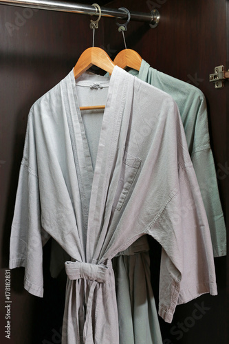 Sleepwear hanging in the cabinet. © zilvergolf