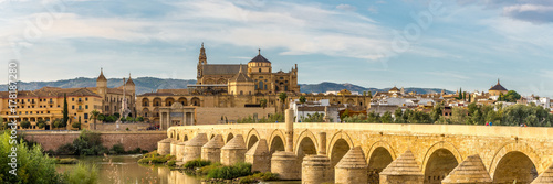 Panoramic view at the Mosque-Cathedral with Roman bridge in Cordoba, Spain photo