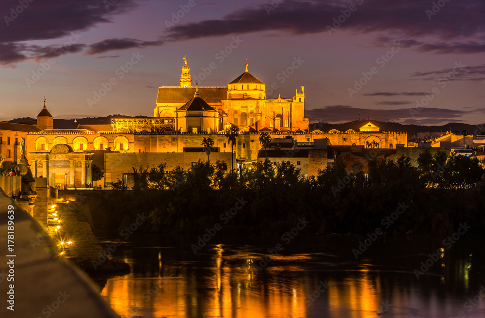 Evening view from Roman bridge at the Mosque-Cathedral in Cordoba, Spain
