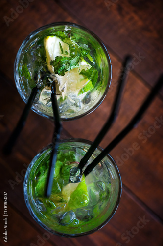 Two Mojito cocktails in glasses