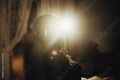 woman  with  theatrical mask and handsome man