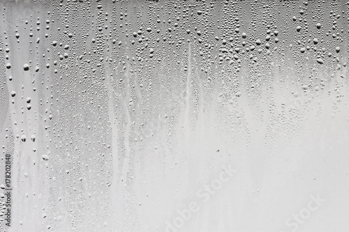 Texture of the rain on the glass