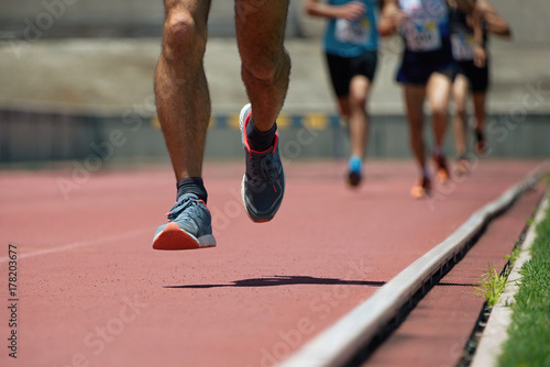 Athletics people running on the track field