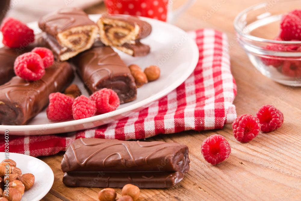 Chocolate rolls with hazelnuts and raspberries. Chocolate rolls with hazelnuts and raspberries.