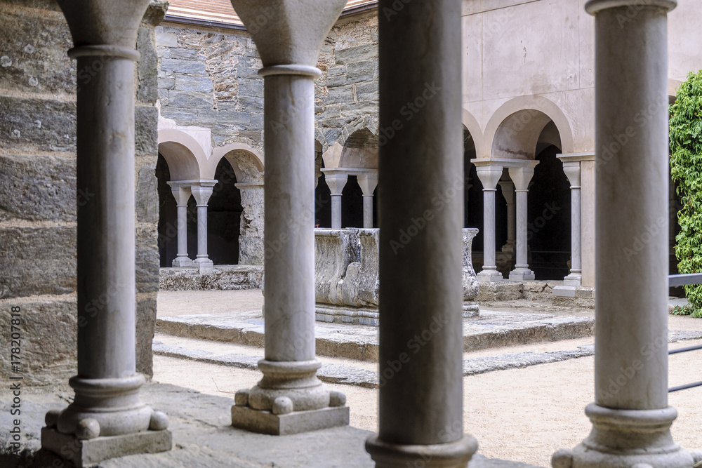 sight of the courtyard of the ruins of the Benedictine abbey of the Romanesque art close to the End of Creus in Gerona, Spain.