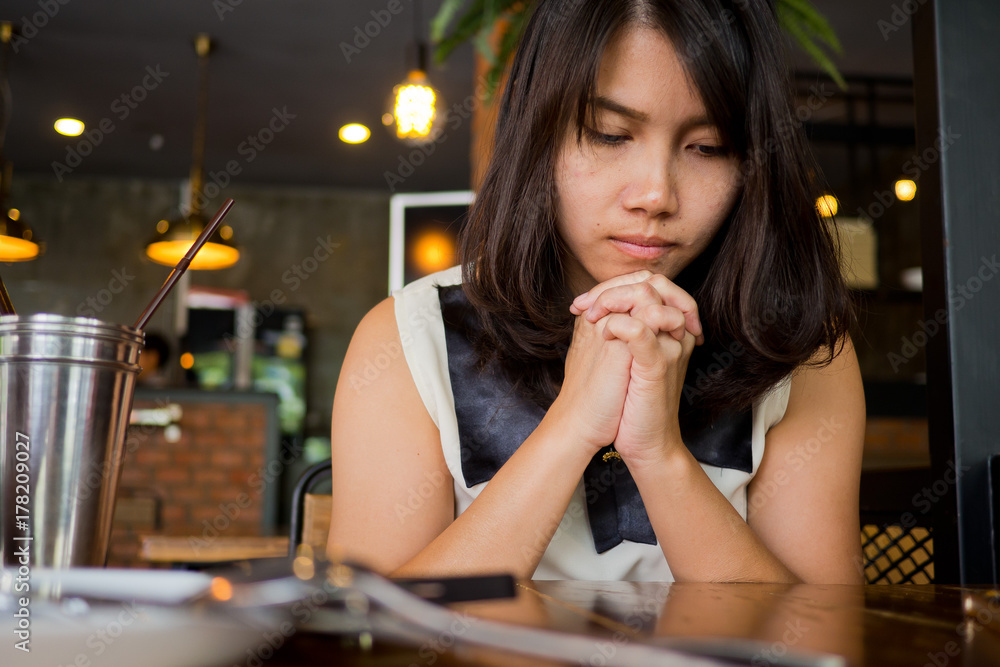 woman praying in morning. Hands folded in prayer woman praying in morning. Hands folded in prayer