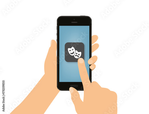 Hand tippt auf Smartphone - Masken