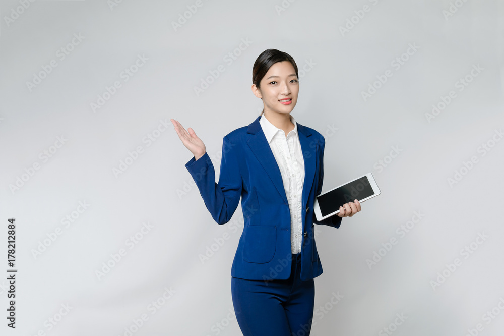 Young Woman use of tablet and finger point up Young Woman use of tablet and finger point up