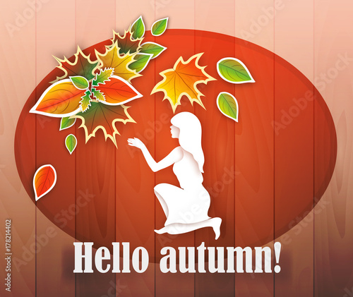 beautiful girl collects autumn leaves.
