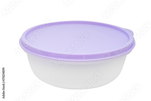 Plastic food container with violet lid isolated
