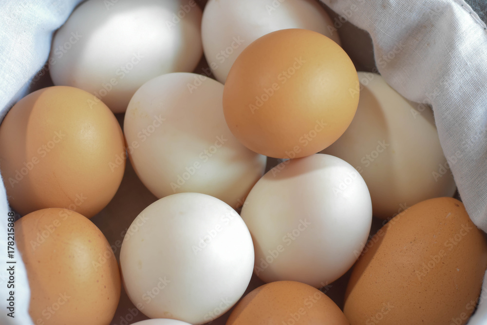 Many eggs are placed in cloth caps. Put on the table
Many eggs are placed in cloth caps. Put on the table