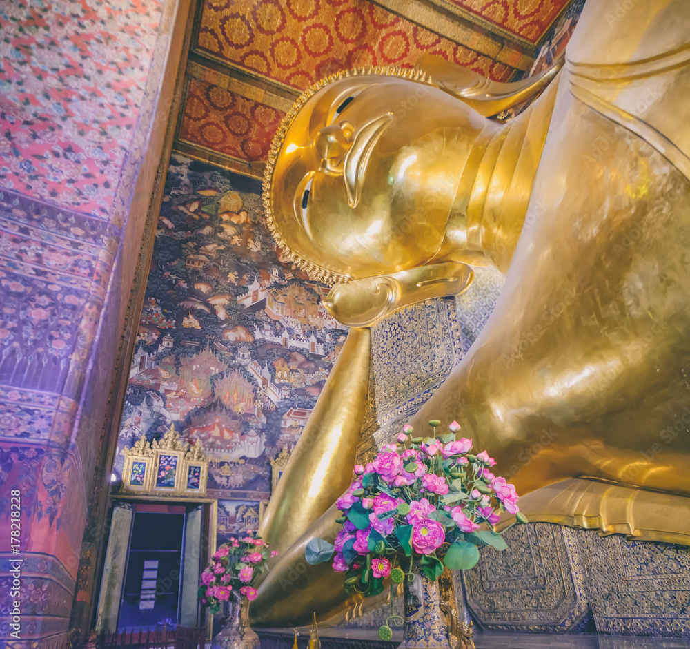 Panoramic view of famous Reclining Buddha statue in Wat Pho Temple. Asian style Buddha Art