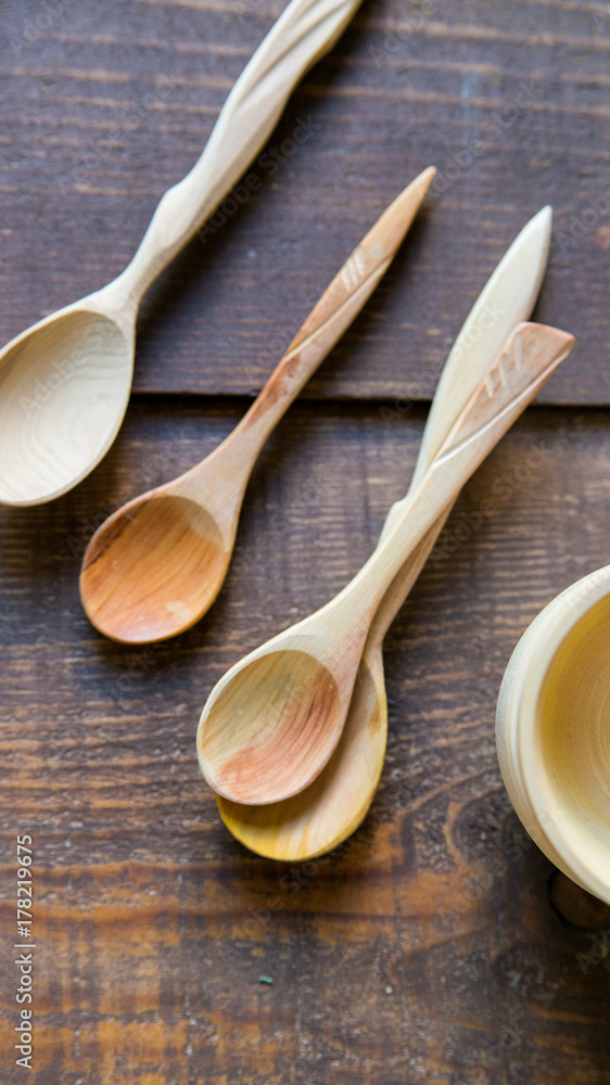Empty wooden bowls and spoons on wooden background Empty wooden bowls and spoons on wooden background