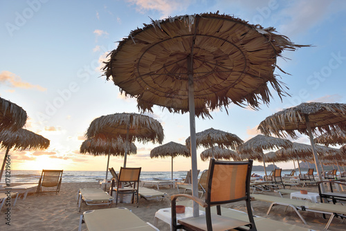 Fototapeta Naklejka Na Ścianę i Meble -  Beach straw umbrellas
