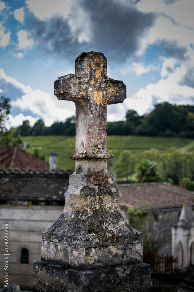 Medieval gravestone cross survives time.