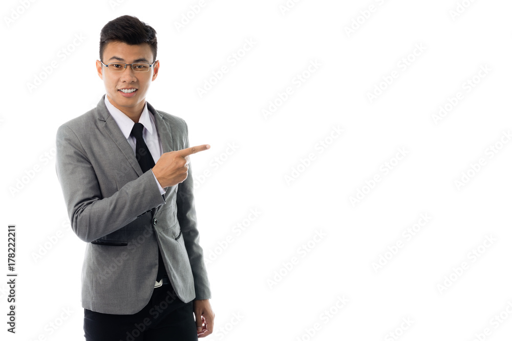 Portrait of a businessman pointed the finger to right side. Isolated on white background with copy space Portrait of a businessman pointed the finger to right side. Isolated on white background with copy space