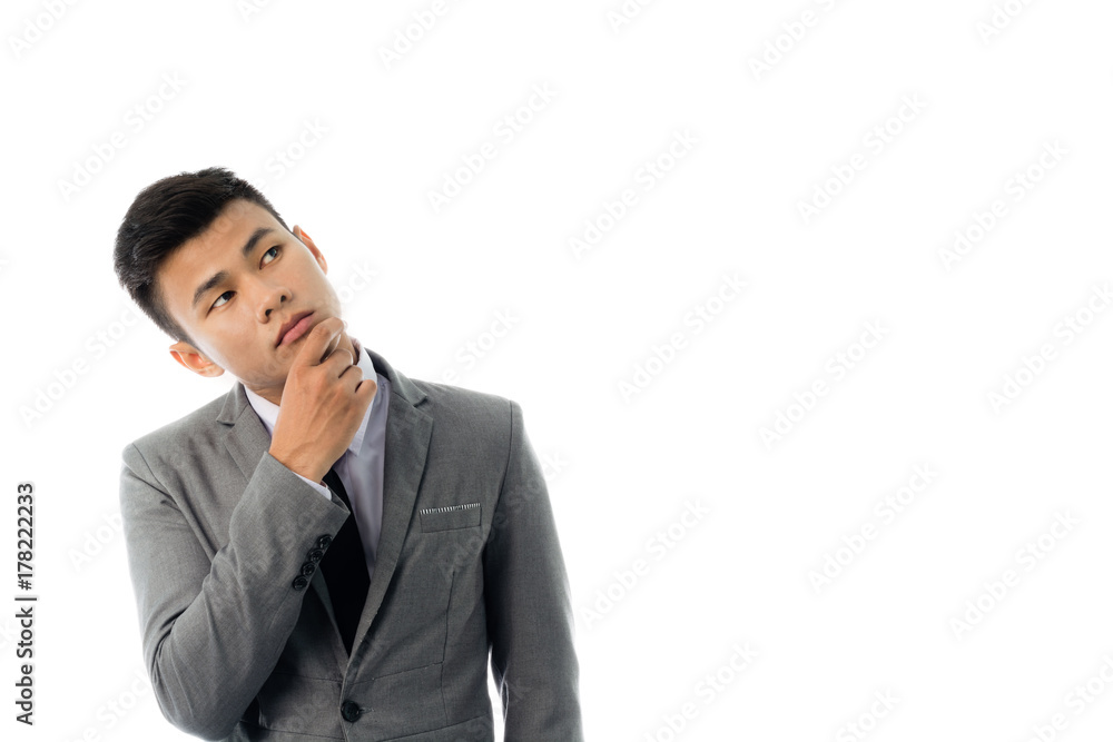 Portrait of a business man thinking with suit. Isolated on white background with copy space Portrait of a business man thinking with suit. Isolated on white background with copy space