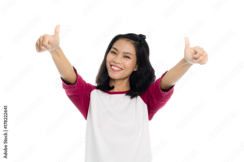 Beautiful asian woman is showing thumb up, portrait studio on white background Beautiful asian woman is showing thumb up, portrait studio on white background