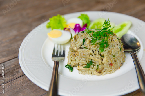 Green Curry Fried Rice Recipe Spicy and flavorful hot Thai kitchen food on wood table