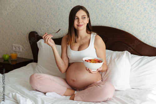 Portrait of a lovely young pregnant woman