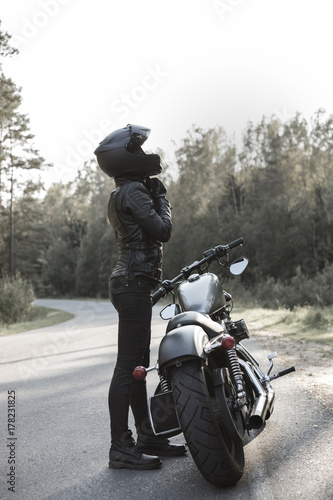 Sexy girl biker and cafe racer motorcycle © Kaponia Aliaksei