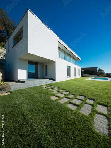 Modern white house with garden