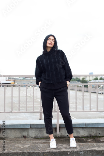 Young woman wearing woolen sweater © Kaponia Aliaksei