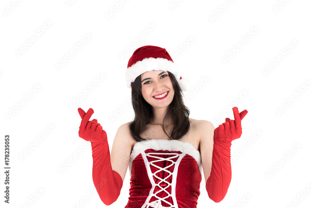 beautiful santa girl wearing santa claus clothes costume doing gesturing small or mini heart sign  over white background