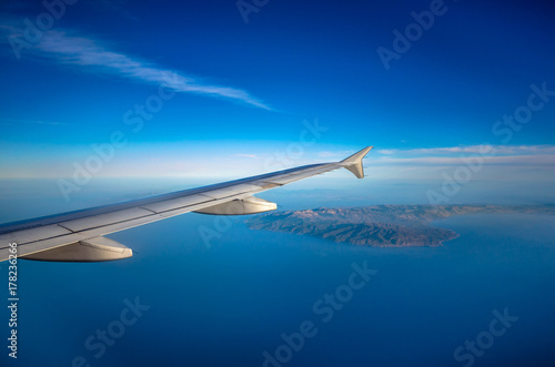 Amazing view from the plane window at the sky.Flight over the aegean sea.