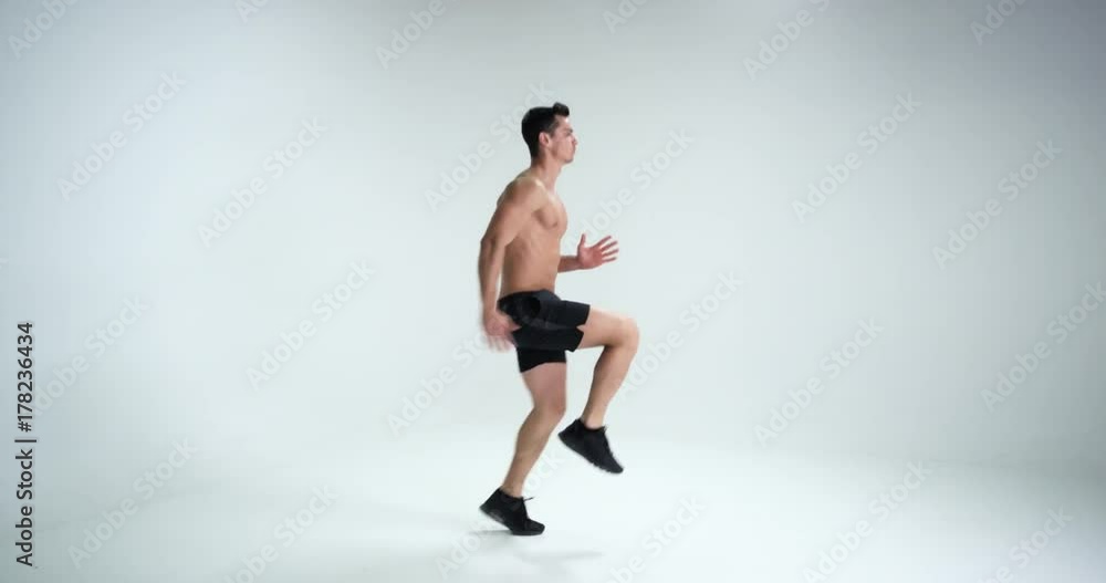 Push-ups - man fitness model training pushups . Fit male fitness trainer working out exercising. RED EPIC. Super Slow Motion. Push-ups - man fitness model training pushups . Fit male fitness trainer working out exercising. RED EPIC. Super Slow Motion.