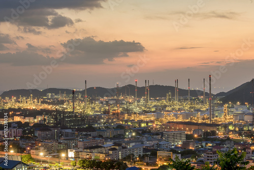 Aerial view Oil refinery.Industrial view at oil refinery plant form industry zone with sunset and cloudy sky. © bannafarsai