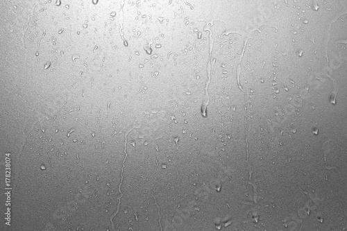Fotografie Water drops on frosted glass texture as background