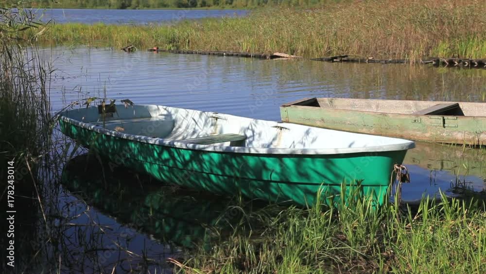 Two boats on the lake in summertime Two boats on the lake in summertime