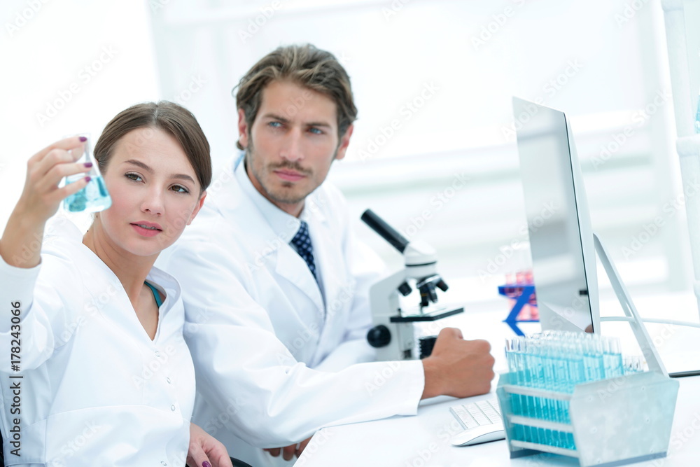 Team of Biologists Researchers Working in Laboratory Team of Biologists Researchers Working in Laboratory