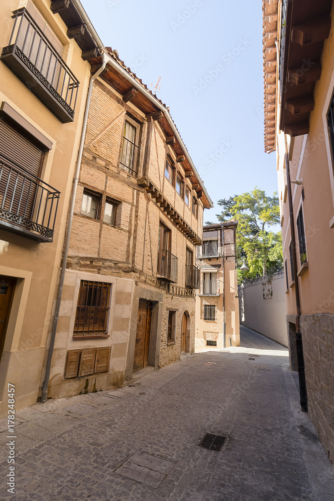 Classic street of the former Jewish quarter (La Juderia) of the medieval city of Segovia, Spain